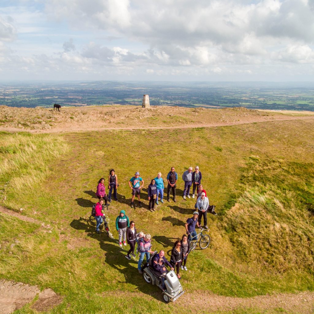 Heart shaped gathering of people by toposcope