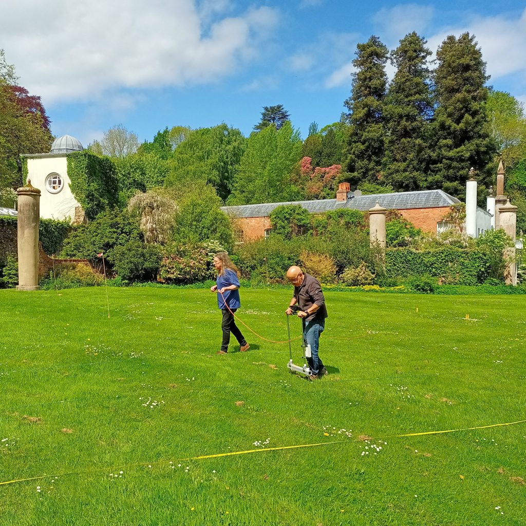 A resistivity by 2 people on the lawns of Hope End